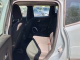 a car that has a seat in the back of it