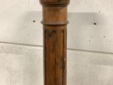 a wooden table with a wooden top and a wooden base