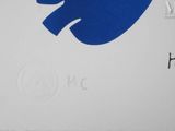 a picture of a toilet sign with a blue elephant on it