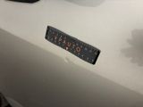a close up of a car with a sticker on it