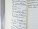 an open book that is sitting on a table