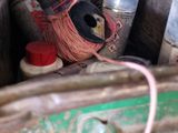 an old suitcase with a bunch of items inside of it