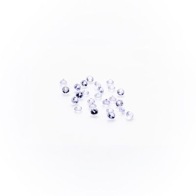 some very pretty white diamonds on a white surface