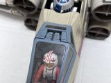 a toy of a star wars vehicle with a starfighter figure in it