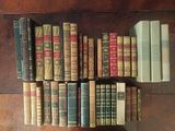 a lot of books that are on a table