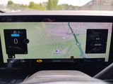 the dashboard of a car with a gps device on it
