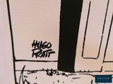 drawing of a door with graffiti on it and a dog laying on the floor