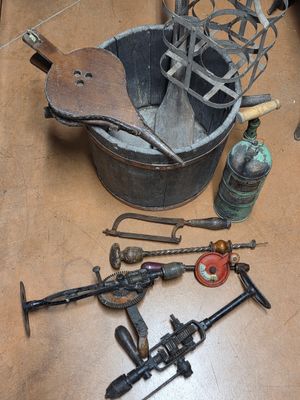 a lot of tools that are sitting on the floor