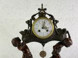 a clock that is sitting on top of a table