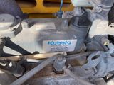 a close up of a car ' s engine with a label on it