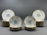 set of six blue and white plates with floral designs on them