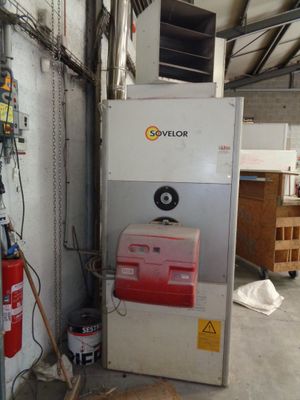 a machine that is sitting inside of a building