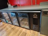 an image of a commercial refrigerator in a kitchen