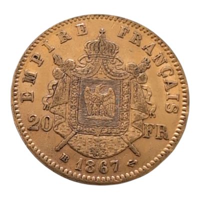 Gros plan sur une pièce d'or ornée d'une couronne
