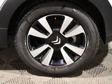a close up view of a tire on a car