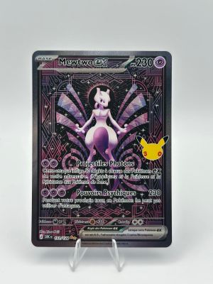 a close up of a pokemon card on a white surface