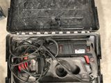 a tool case with tools inside of it on the floor