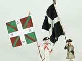 two figurines of a man holding a flag and a flag pole