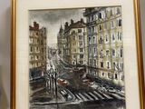 a picture of a painting of a city street in a gold frame