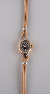 TYL. Montre de dame en or jaune 18K 750°/°°, tête d'aigle, e…