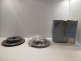 an image of a pair of brake discs sitting on a counter