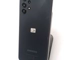 the back of a black samsung phone with a camera attached to it
