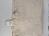 a close up of a piece of cloth with a tag on it