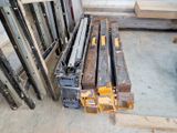 several pieces of wood are stacked on top of each other in a room