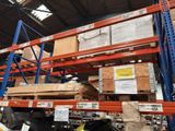 many boxes on the shelves in the warehouse