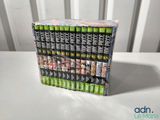 a close up of a stack of dvds on a table