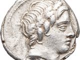 une pièce d'argent portant une tête d'homme