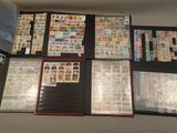 many different types of stamps on the table