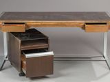 an image of a desk with a drawer underneath it