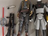 star wars action figures are lined up on a white surface