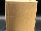 a box that is sitting on a stand on a table