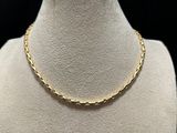 a gold chain necklace on a mannequin mannequin mannequin mannequin mannequin mannequin mannequin mannequin manne