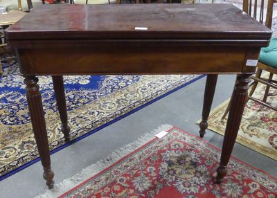 a wooden table with a small drawer on top of it