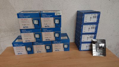 many boxes of electronic devices sitting on a table