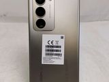 a close up of the back of a phone with a sticker on it