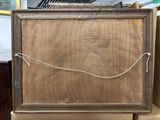 a picture of a wooden cabinet with a wire on it