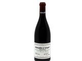 a bottle of wine that is sitting on a table