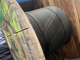 two spools that are sitting next to each other on the floor