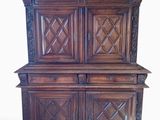 an image of a wooden cabinet on wheels