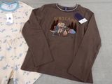 a brown shirt and pants with a bear on it
