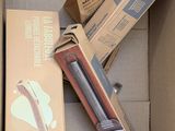 a cardboard box with a pair of scissors inside of it
