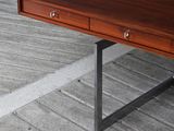 a wooden table with two drawers on top of it