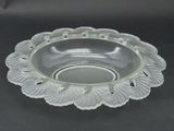 a clear glass bowl with a decorative design on it
