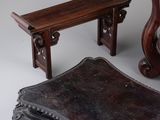 two pieces of furniture that are sitting on a table