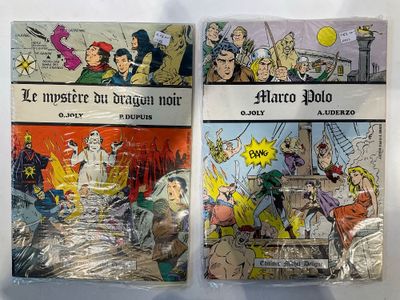 Deux bandes dessinées sont posées l'une sur l'autre sur une table.
