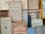 a lot of books on the table together
